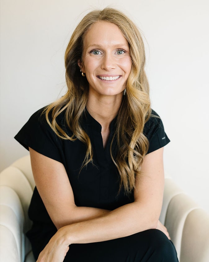 a woman smiling for the camera